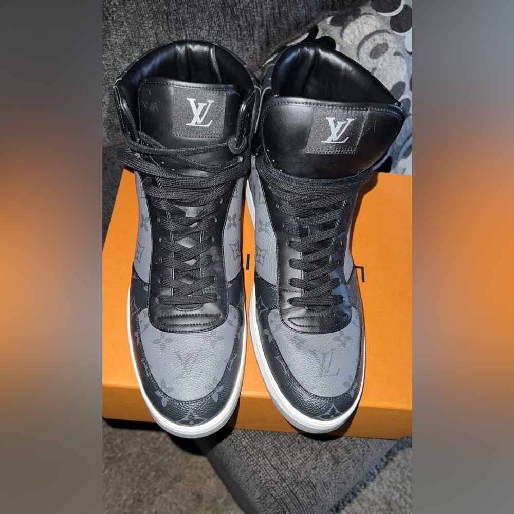 One of Louis Vuitton's signature styles, the Rivoli sneaker boot Only worn twice